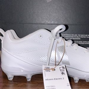 New in box. Unisex Adidas adizero electric 2 youth cleat. Size 4.Never worn
